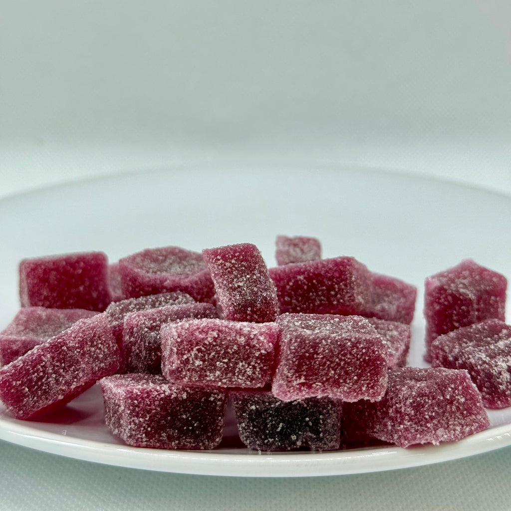 settle in cherry pop hemp-derived THC gummies with fresh cherries